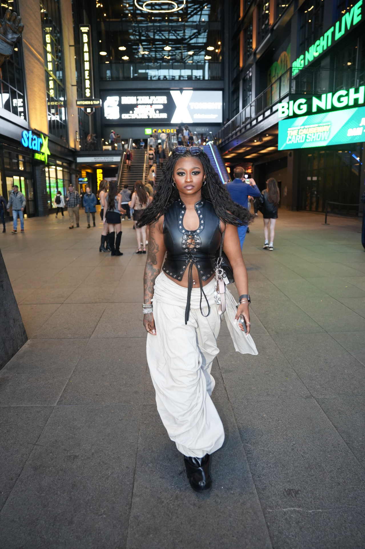 Black and cream event look styled for an urban night setting